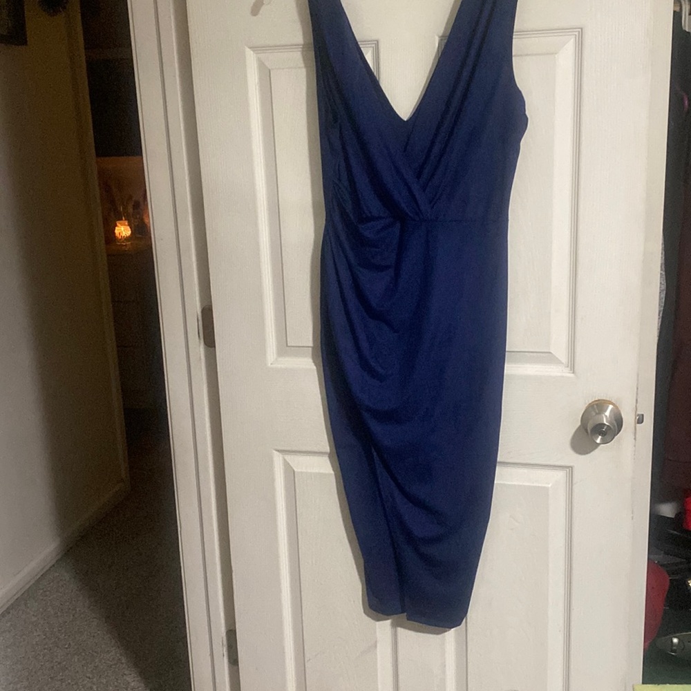 Beautiful suede feeling dress!worn one time,size large fashion, nova.